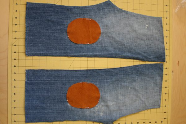 Toddler pants made from an old pair of jeans with knee patches added for longevity